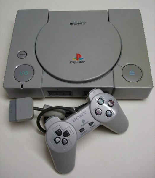 Console Sony PlayStation PS1 grise avec manette