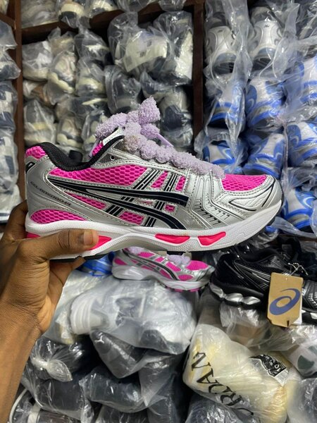 Baskets de course roses femme