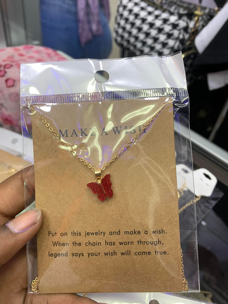 Pendant with red butterfly