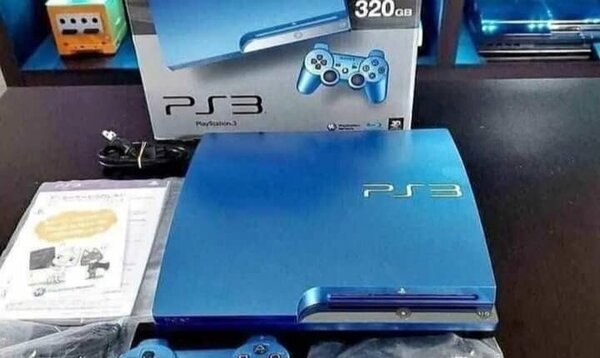 Console Sony PS3 avec 2 manettes