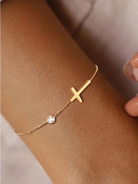 Bracelet croix doré élégant