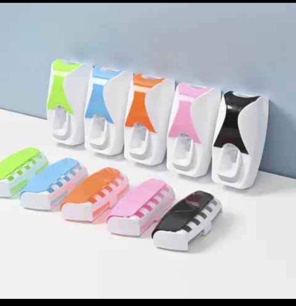 Toothpaste dispenser, toothbrush holder