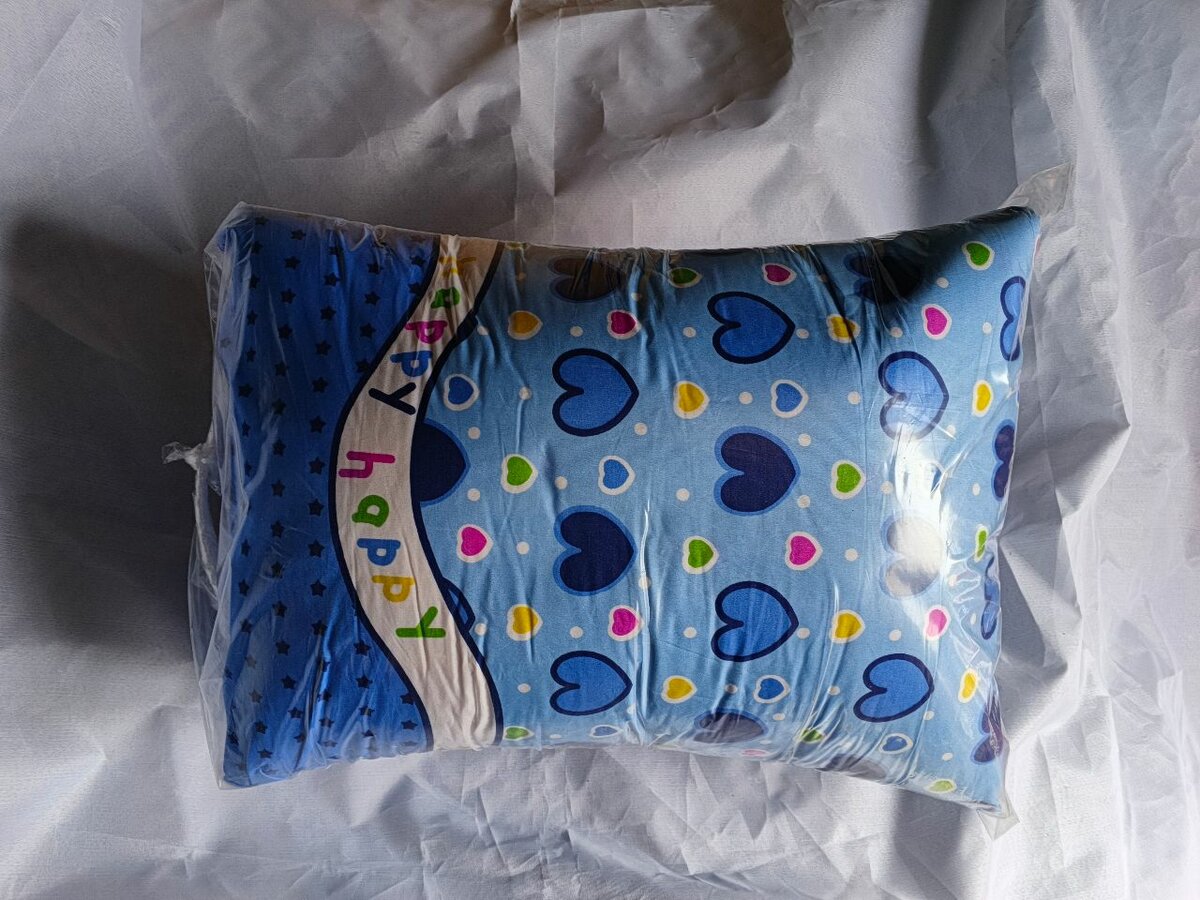 Coussin décoratif bleu coeur