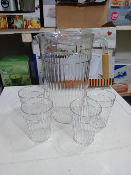 Plastic juice jar with 4 cups