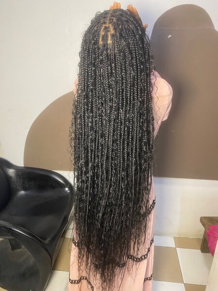 Perruque tressée à la main