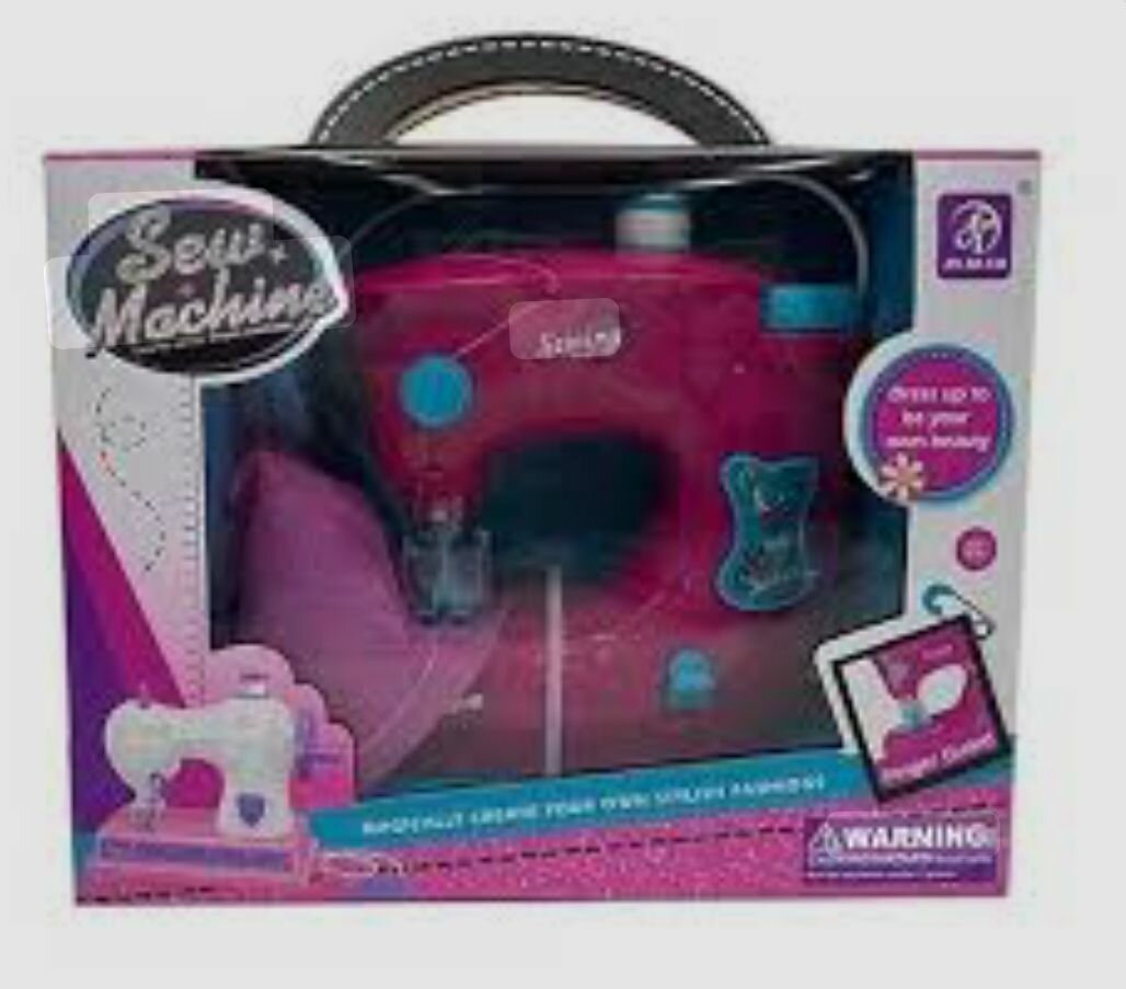 Machine à coudre jouet rose