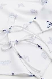 Haut dos nu à imprimé papillons