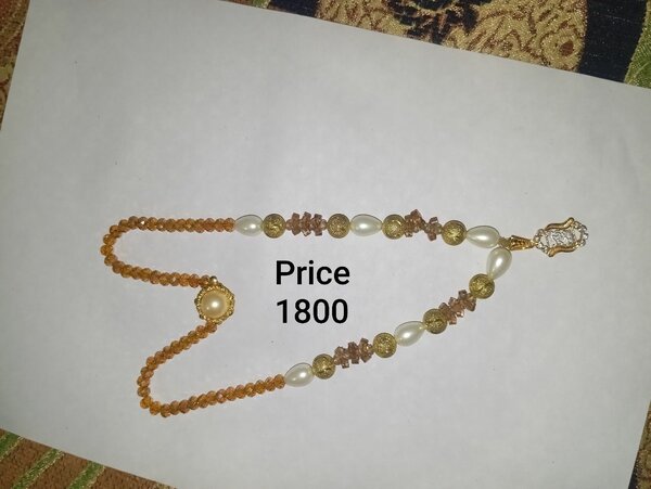 One kerat gold locket