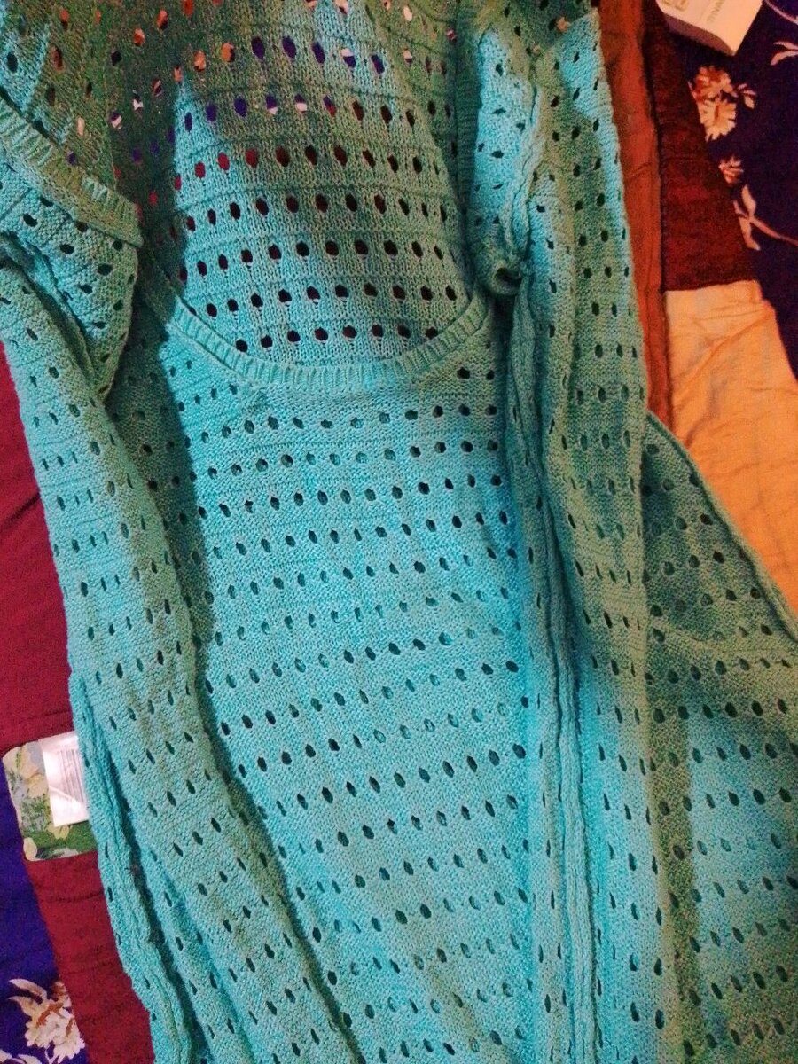 Gilet en crochet turquoise