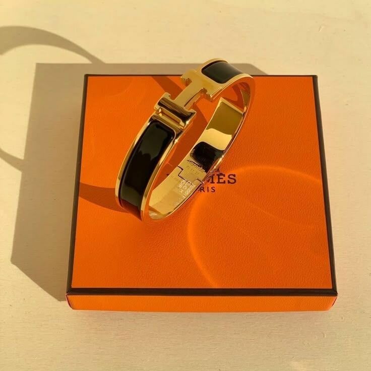 Bracelet Hermes en métal doré