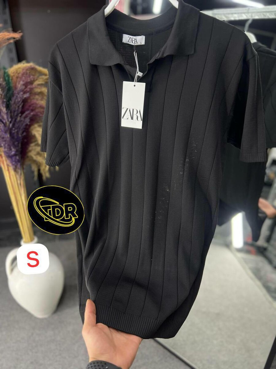 Polo en maille côtelée élégante