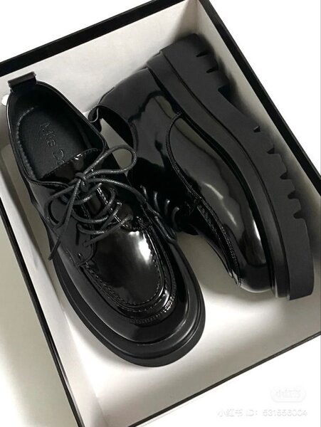 Chaussures derby en cuir noir