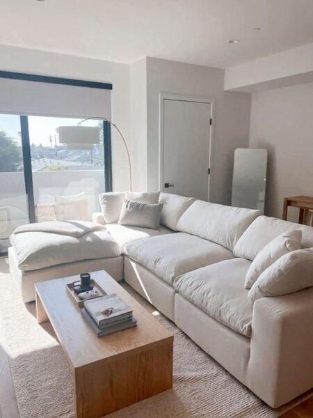 Canapé d'angle en tissu blanc