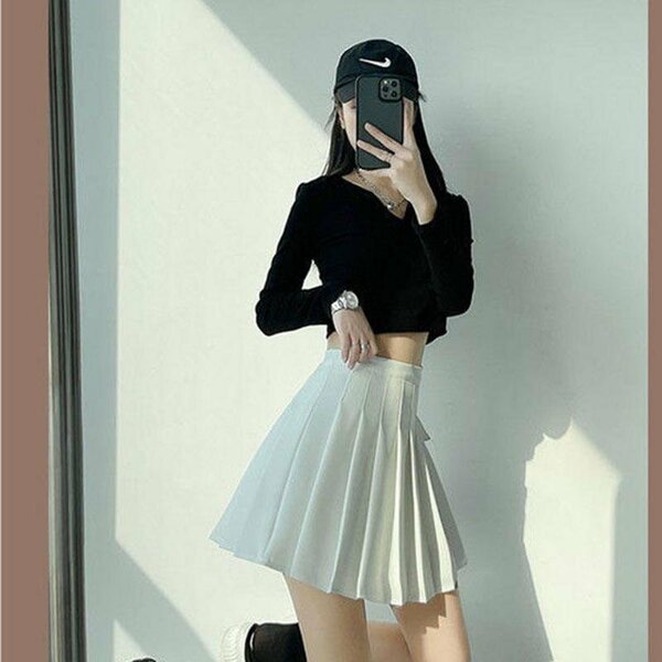 Jupe plissée blanche élégante