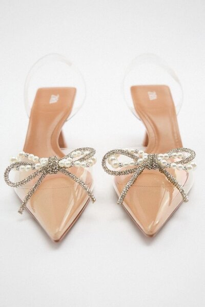 High heels with butterfly knots and pearl embellishments