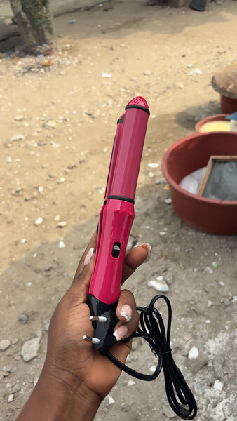 Fer à lisser et boucler 2-en-1