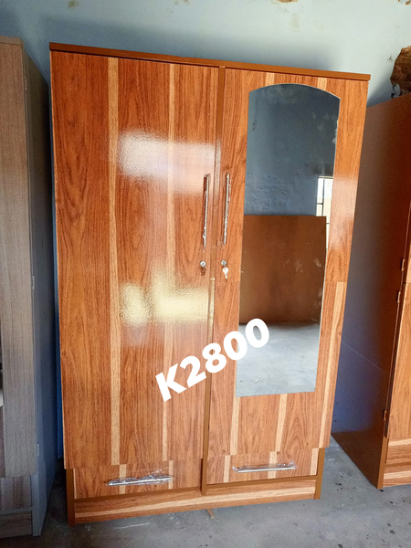 brown wardrobe with mirror