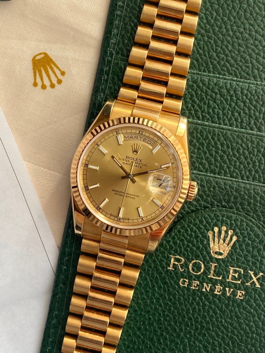 Montre Rolex en acier et or