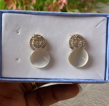 Earrings with a large crystal