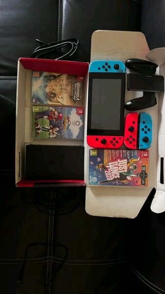 Nintendo Switch avec 3 jeux