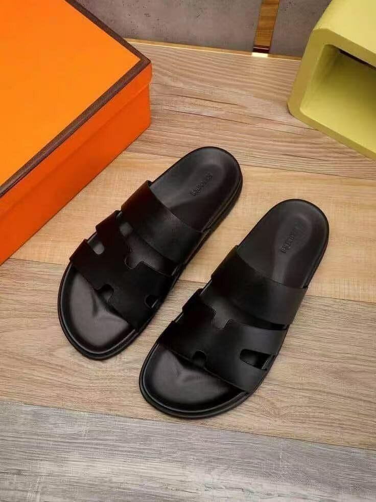 Sandales en cuir noir Hermès