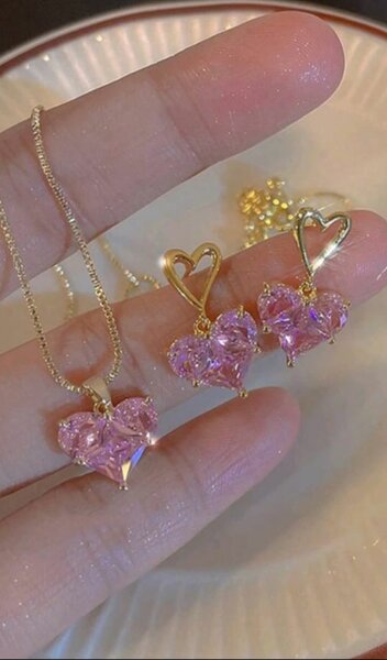 Collier et boucle cœur rose