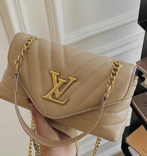 Beautiful fashionable women's handbag color beige