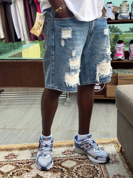 Shorts en jean déchiré homme