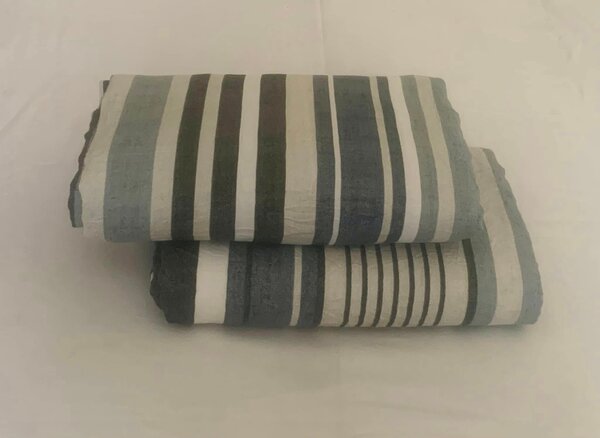 A sheet with gray-white and black stripes