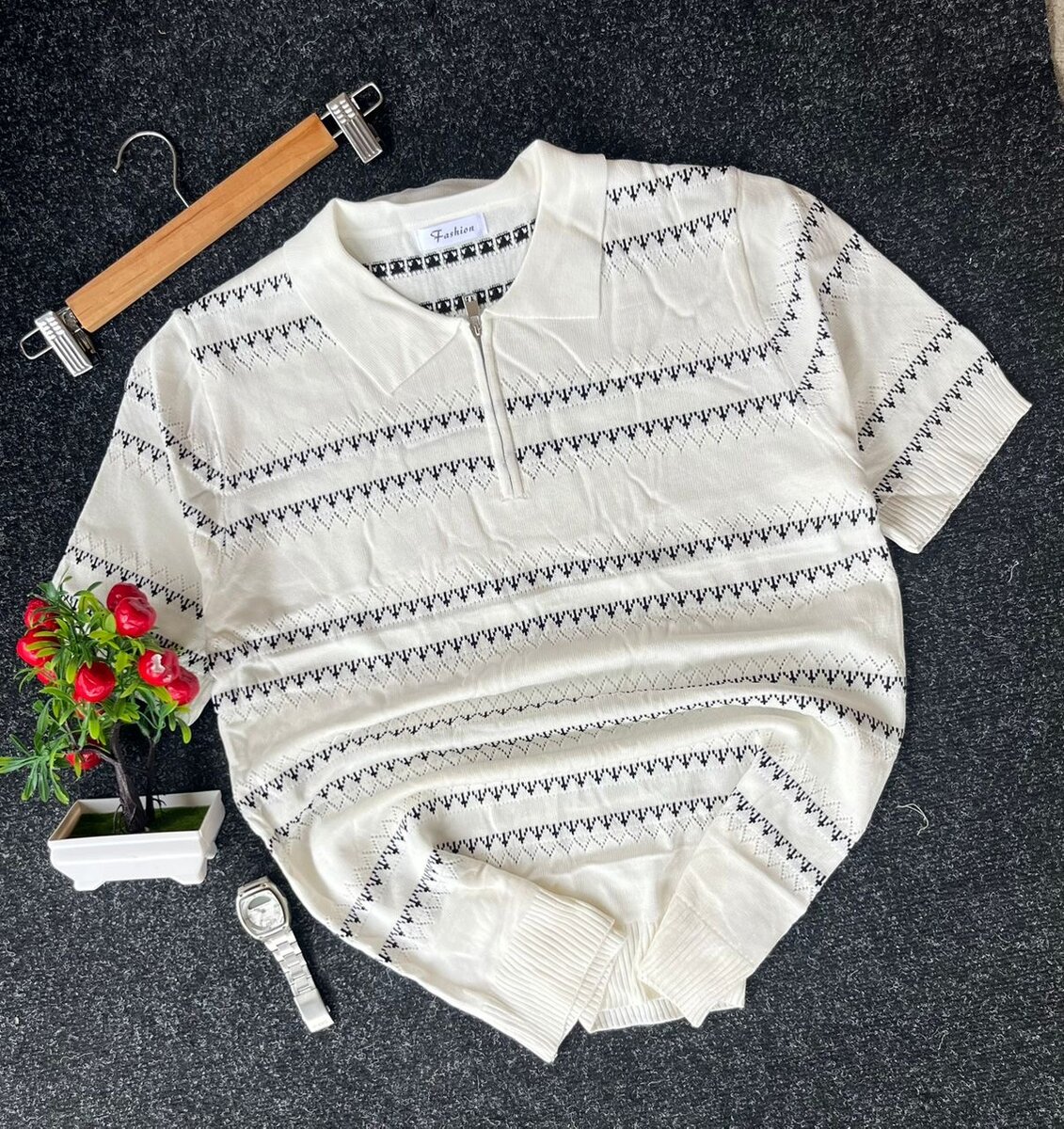 Polo léger en tricot rayé