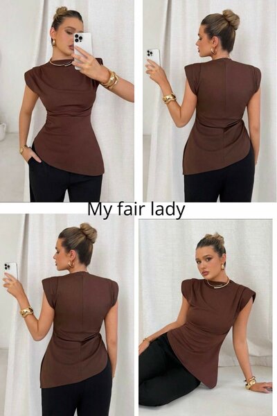 Blouse à épaulettes élégante