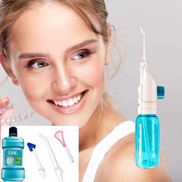 Manual mouth flosser