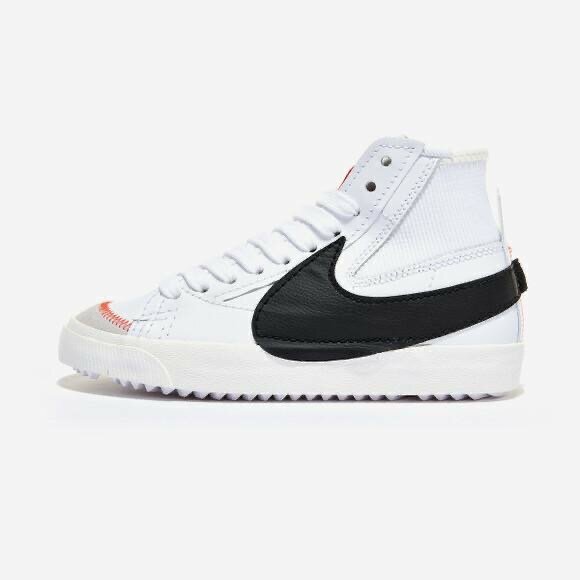 Sneakers montantes en cuir blanc et noir