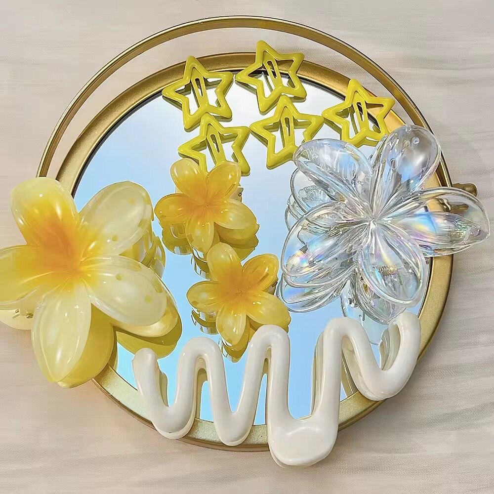 Pinces à cheveux fleuries colorées