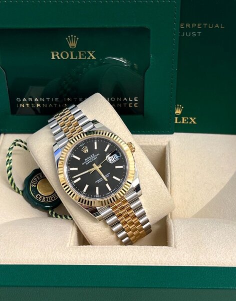 Montre Rolex en acier et or
