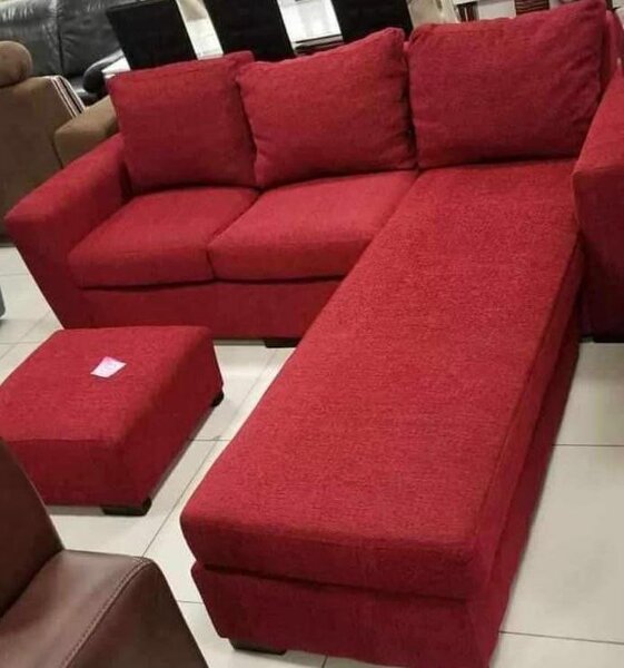 L-couch with throw pillows and footrest