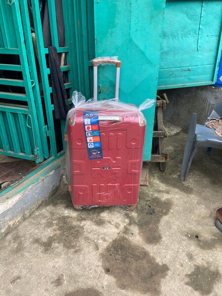 Valise rigide extensible rouge