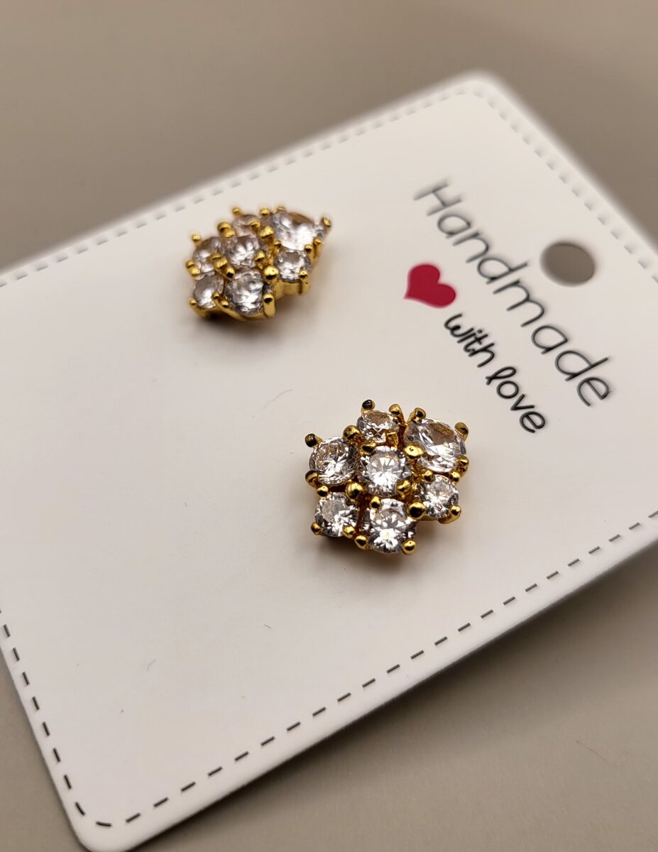 Zircon stud With golden base