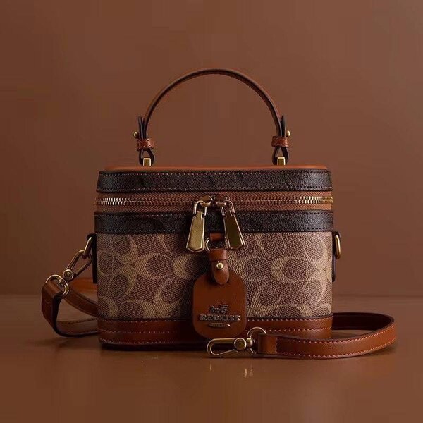 Sacs coach très bonne qualité