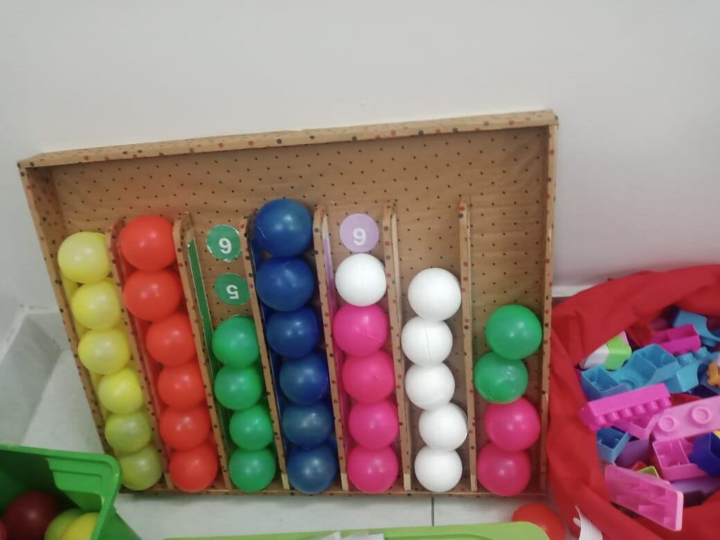 Wood cutting. Colour and number learning toy. Guns s