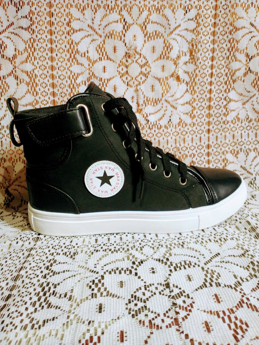 Chaussures montantes Converse en cuir noir