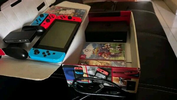 Nintendo Switch avec 3 jeux