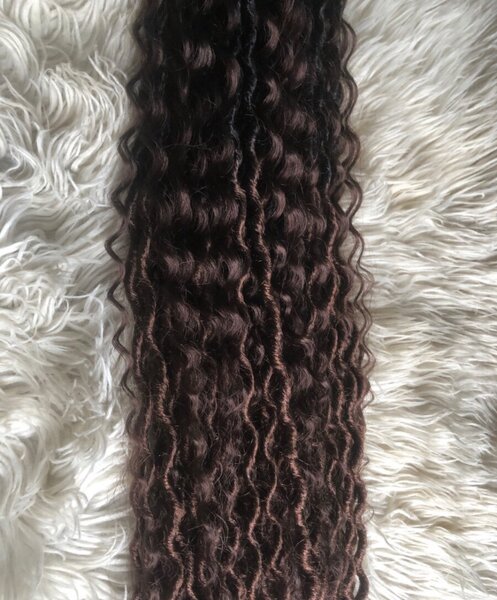 Extensions cheveux bouclés