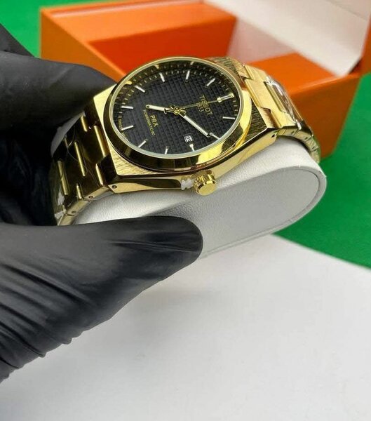 Montre homme en acier doré