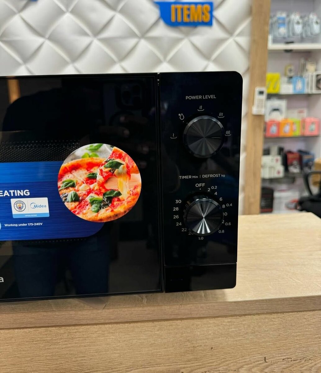 MIDEA 20L MICROWAVE OVEN...