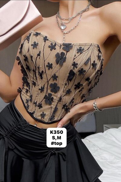 Beige top with black floral print