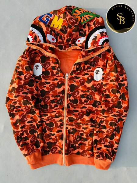 Veste à capuche camouflage orange