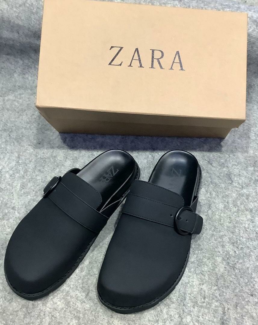 Mules en cuir noir élégantes