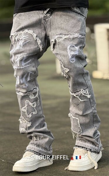 Jeans déchirés mode unisexe