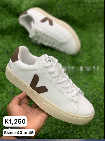 white and brown sneakers